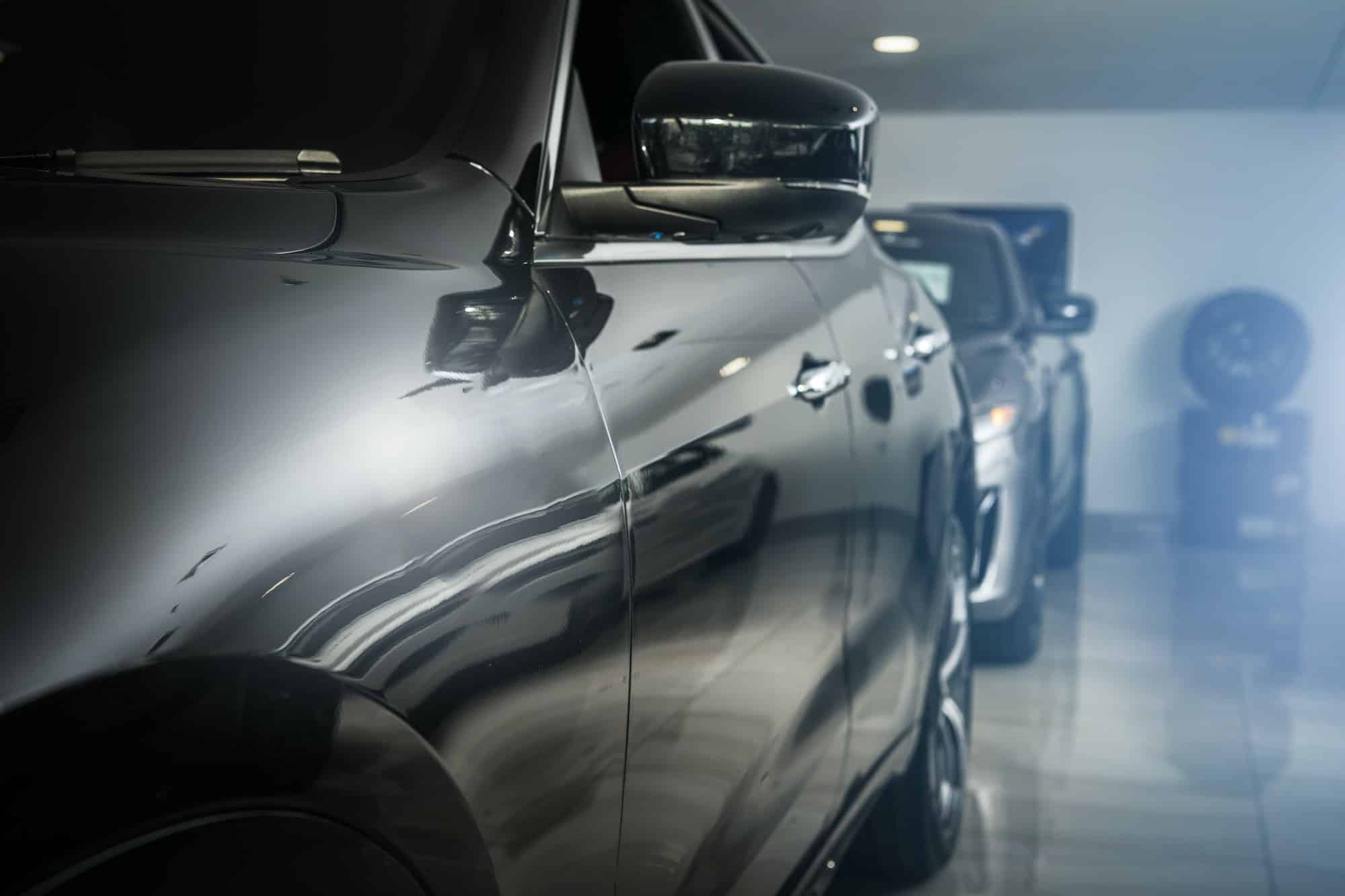 modern-luxury-vehicles-for-sale-inside-dealership-showroom2